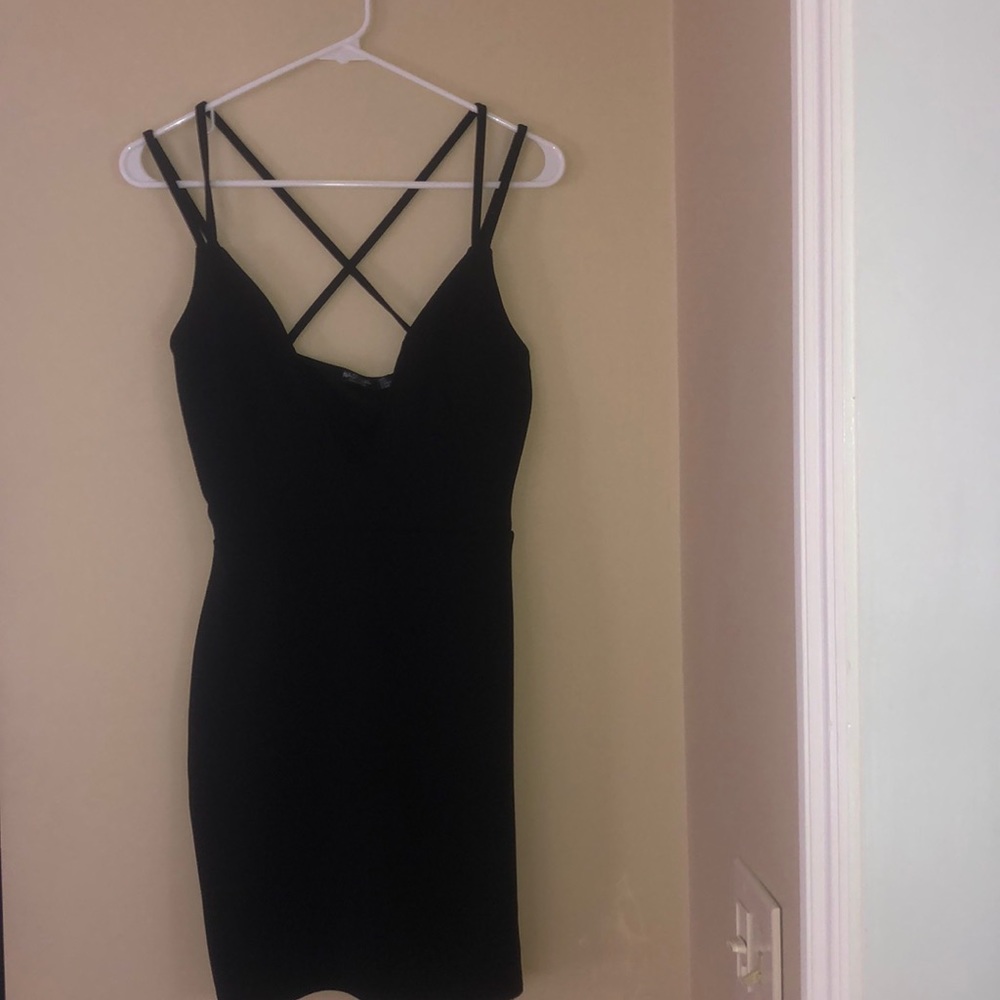 Little black dress with double strap cross detail